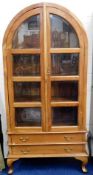 A glazed book case, possibly rosewood, with two do