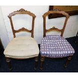 A pair of upholstered 19thC. carved walnut chairs