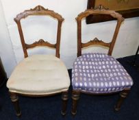 A pair of upholstered 19thC. carved walnut chairs