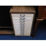 A ten drawer steel filing cabinet