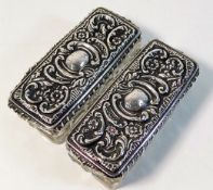 A pair of silver topped dressing table tidies, one