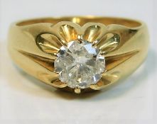 A large 18ct gold gypsy style ring set with approx