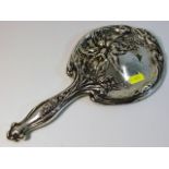 A decorative silver backed mirror, some faults 11.