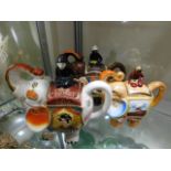 Three Oriental tea pots as elephants