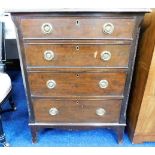 A low level chest of four drawers with brass fitti