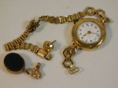 A 9ct gold watch case & strap twinned with other g