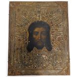 A c.1900 Russian style icon on hammered metal on p