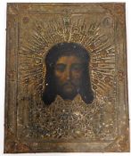 A c.1900 Russian style icon on hammered metal on p