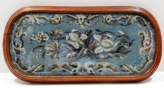 A glazed Victorian walnut mounted beadwork stand f