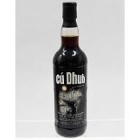 A bottle of Cú Dhub whisky