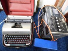 A Remington typewriter twinned with a Coomber tape