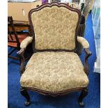 A Victorian upholstered armchair. Provenance: From