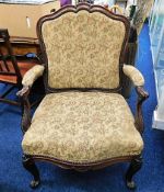 A Victorian upholstered armchair. Provenance: From