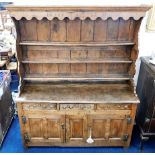 A good, early 18thC. oak dresser with drawers & cupboards under, 76in high x 62in wide x 22in deep.
