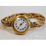 A ladies 18ct gold cased wrist watch with 15ct gol