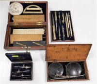 A boxed drawing set, a set of opium scales & a sma