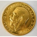 A good George V 1911 full gold sovereign with unus