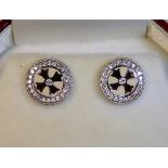 A pair of 18ct white gold earrings with enamelling