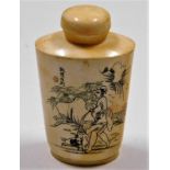 A 20thC. Japanese bone snuff bottle with scrimshaw