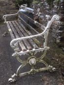 An antique, heavy garden bench 73in long, with Coa