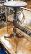 A decorative 19thC. turned low level oak torchere