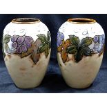 A pair of Doulton Lambeth stoneware vases with imp