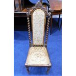 A 19thC. oak Abbotsford style chair with barley tw
