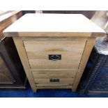 A modern solid oak filing cabinet 33.5in high x 24