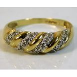 A 9ct gold ring set with diamonds 2.1g size S