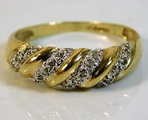 A 9ct gold ring set with diamonds 2.1g size S