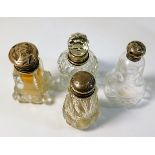 Three silver topped or mounted scent bottles & a s