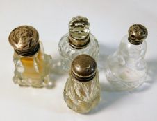 Three silver topped or mounted scent bottles & a s