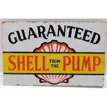 A large double sided enamel sign of motoring interest "Guaranteed Shell from the Pump" 24in wide x 1