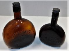 An Irvines wine lidded bottle 8.5in tall twinned w