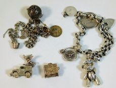 A silver charm bracelet, a silver Land Rover charm