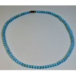 A turquoise beaded necklace 17in long 17g