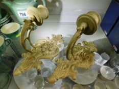 Two decorative candle wall sconces