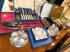 A silver plated five set condiment set twinned wit