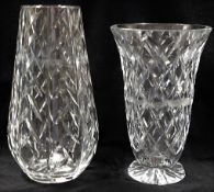 A large Waterford crystal vase twinned with one un