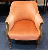 A 19thC. upholstered tub chair. Provenance: Origin