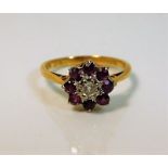 An 18ct gold ring set with ruby & diamond 3g size K