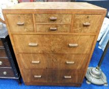 An art deco Heals of London style seven drawer walnut veneer chest of drawers 39in high x 30in wide