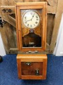 An oak cased British Time Recorder Co. Ltd workclo