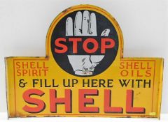 A large double sided enamel sign of motoring inter