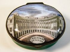 An antique enamel patch box featuring the Crescent