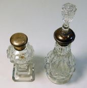 Two silver topped scent bottles