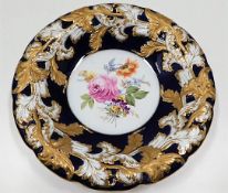 A Meissen porcelain dish with gilding to relief de