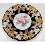 A Meissen porcelain dish with gilding to relief de