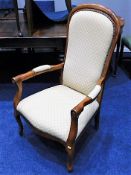 An upholstered mahogany armchair. Provenance: Originally from Treworgey Manor House, Cornwall, submi