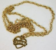 A 9ct gold 18in necklace with "Grandma" pendant 4.